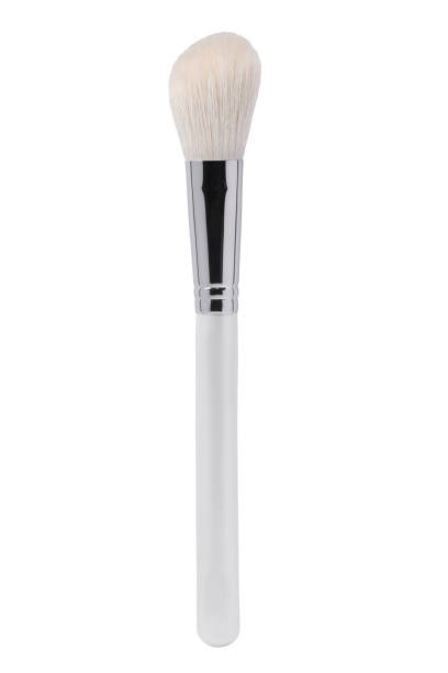 istock The white brush for cosmetics is isolated on a white background. 1211442658