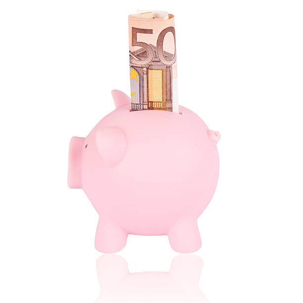 istock fifty euro banknote and coinbank 121144339