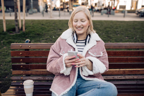 istock Girl sitting on the bench and relaxing 1211444759