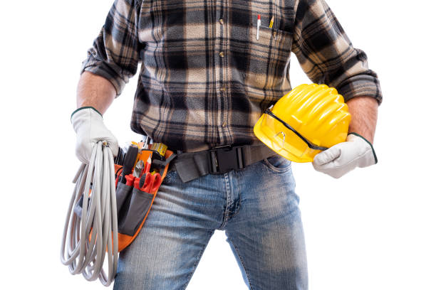 istock Electrician with tool belt on a white background. Electricity. 1211445479