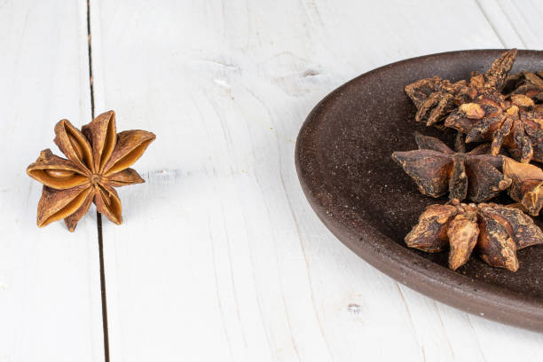 istock Badian star anise on grey wood 1211446753