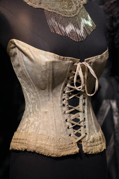 istock Beautiful retro corset on a mannequin close-up 1211449944