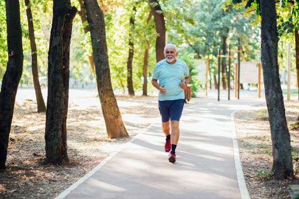 istock Senior man running in the park 1211456996