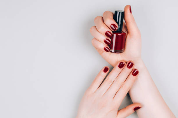 istock Manicure and bottle of nail polish 1211457400