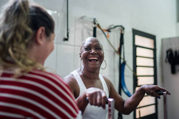 istock Happy senior woman doing physical therapy 1211458276