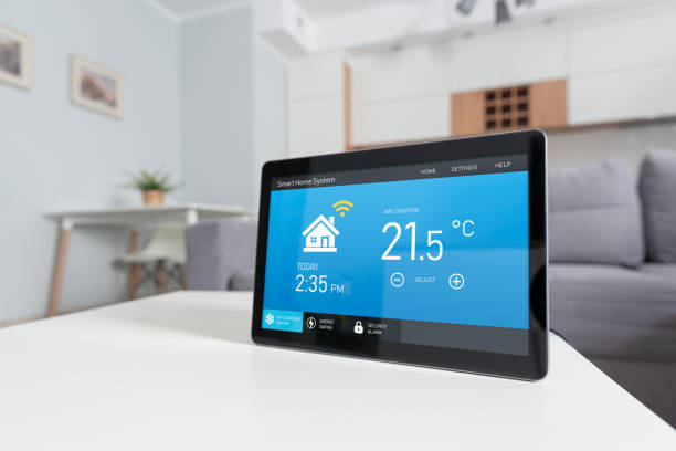 istock Smart home system device in modern living room 1211458474