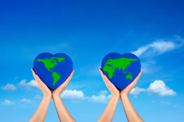 istock Conceptual environmental image of hands holding world 1211458540