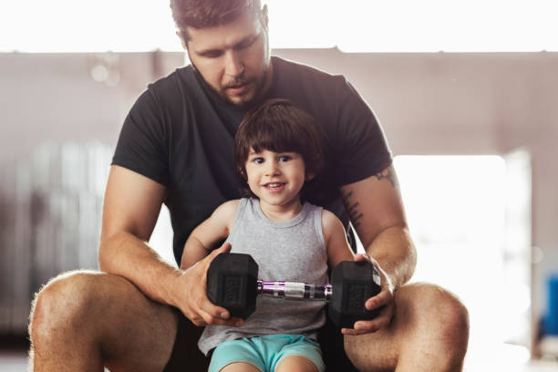 istock Teaching him the importance of staying healthy 1211461817