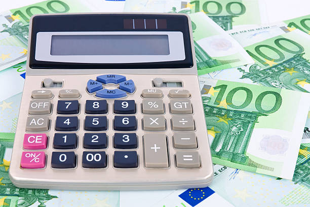 istock euros background and calculator 121146403
