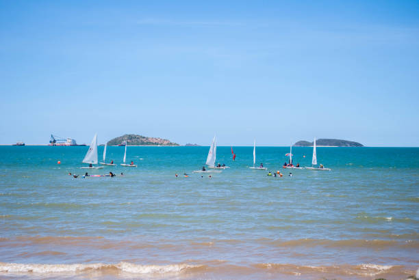 istock People playing sailboat on the sea 1211467577