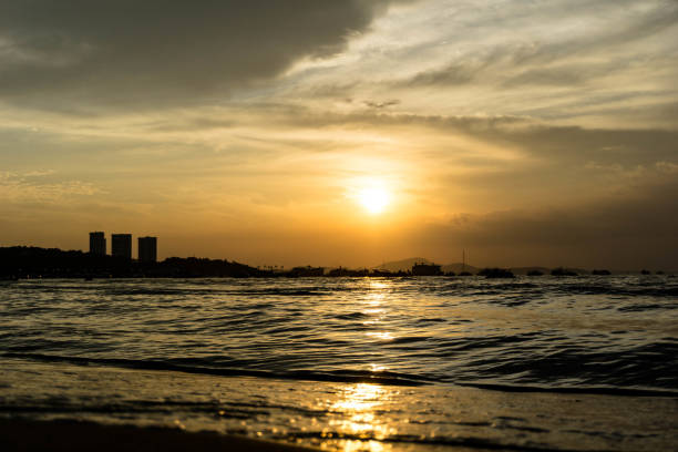 istock Silhouette sunset with boat at sea 1211467630