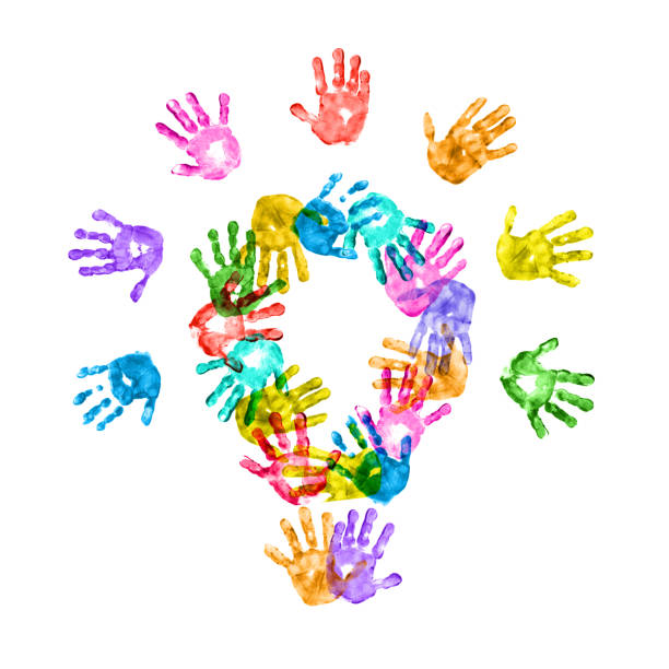 istock Lightbulb of Colorful Children Handprints on White Background 1211473762