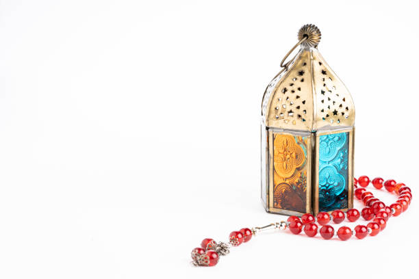 istock Arabic lantern and tasbih (rosary beads) isolated against white 1211484465