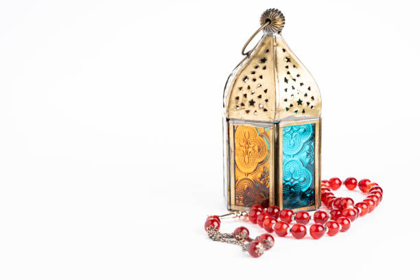 istock Arabic lantern and tasbih (rosary beads) isolated against white 1211484508