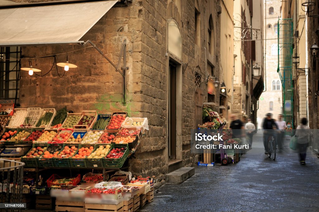 Street in Florence, Italy Street in Florence, Italy with small farmers market Market - Retail Space Stock Photo