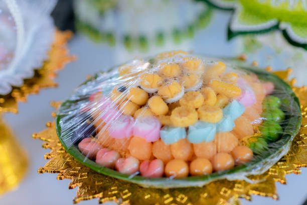istock Thai sweets, or Khanom Thai have unique in The film's host, colorful appearance and distinct flavors The film's host. The art of Thai desserts have been passed down through the generations. 1211491049