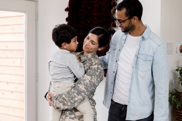 istock Mom and dad listen as boy talks about sadness 1211494793