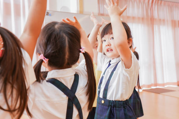 istock Children singing at a kindergarten 1211496111