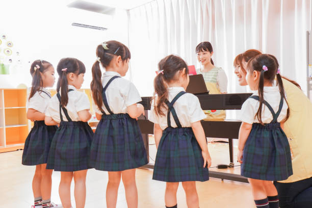 istock Children singing at a kindergarten 1211496799