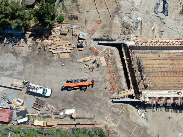 istock Aerial view of bridge construction crossing the highway 1211498775