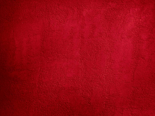istock Abstract red background. Toned bright red grainy concrete texture for background. 1211498779