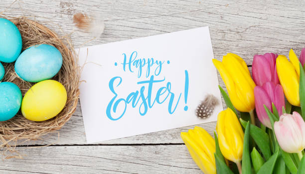 istock Easter greeting card with eggs and tulips 1211500936