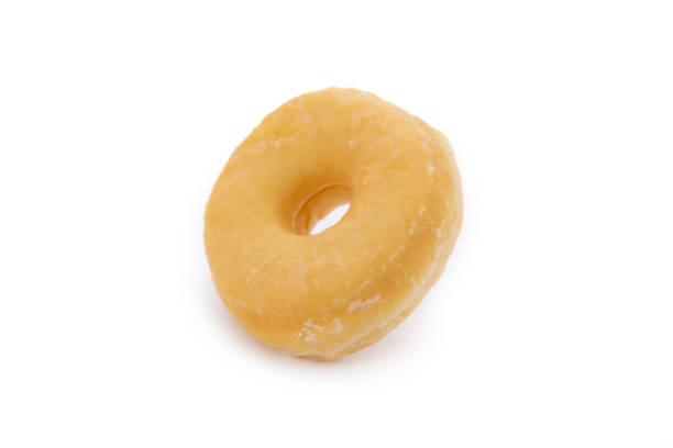 istock Glazed donut isolated on white background. 1211501615