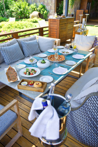 istock Summmertime Dinner tables near the sea 1211502179
