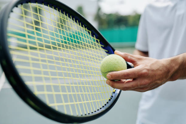 istock Tennis player serving ball 1211503490