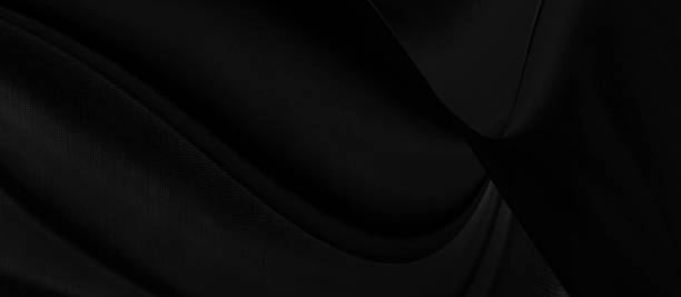 istock Black gray satin dark fabric texture luxurious shiny that is abstract silk cloth panorama background with patterns soft waves blur beautiful. 1211504089