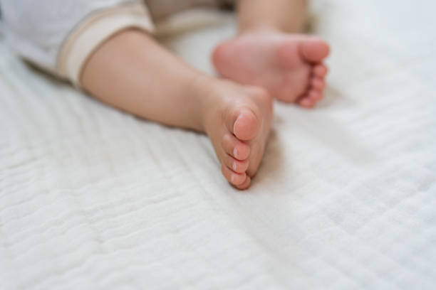 istock Close up of sleeping baby's feet 1211505859