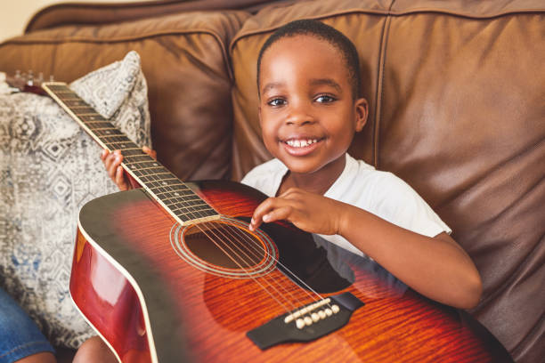 istock Soon I'll be big enough to play it by myself 1211508006