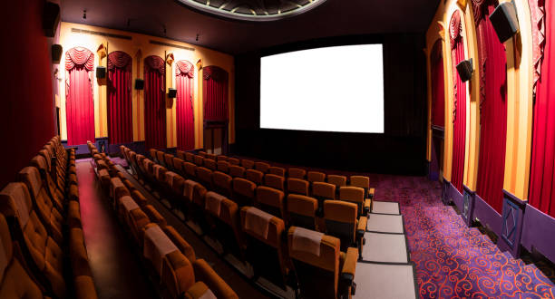istock Cinema theater showing empty white movie screen. 1211508249