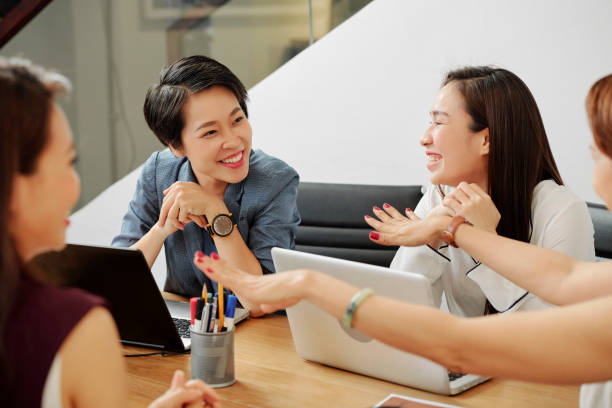 istock Cheerful talking businesswomen 1211509474