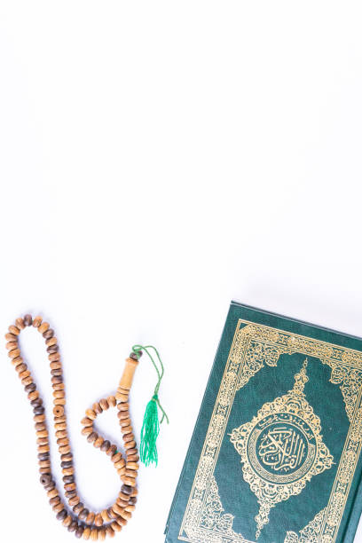 istock Flat lay composition of Qoran and Tasbih 1211513388