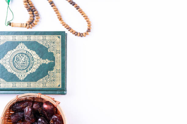 istock Flat lay composition of Qoran and Tasbih 1211513431
