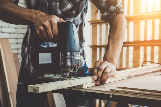 istock Carpenter working on wood craft at workshop 1211513578