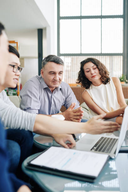 istock Business team watching product presentation 1211519952