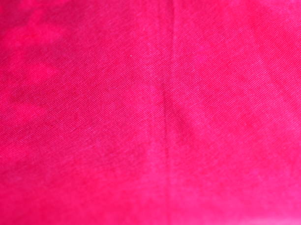 istock Wrinkles on the fabric, Red abstract textile, cotton pattern background 1211522756