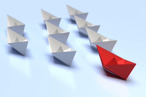 istock Leadership and business concept. One red leader ship 1211522800