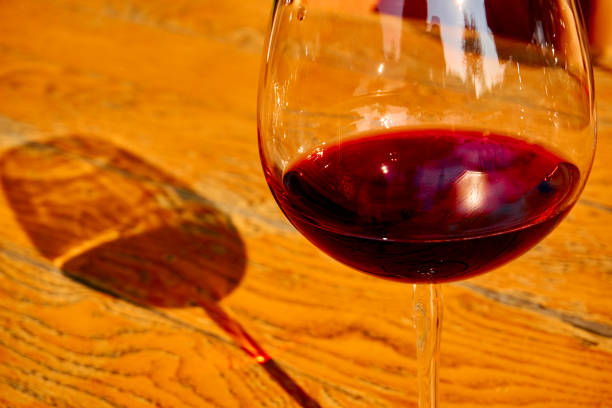 istock Glass of Fresh Red Wine for Celebration 1211524222