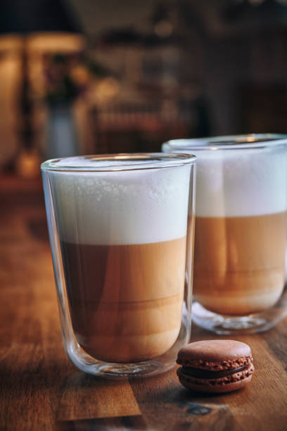 istock Latte Macchiato Served with Macarons 1211525777