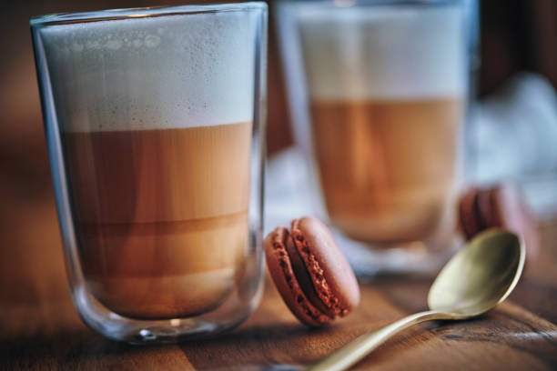 istock Latte Macchiato Served with Macarons 1211525789