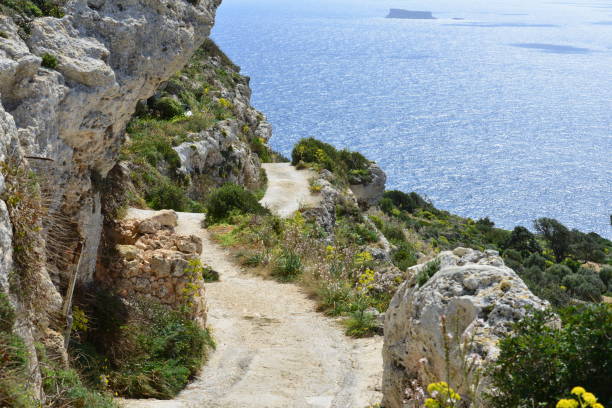 istock Narrow cliff path on the Dingli cliffs in Malta 1211528361