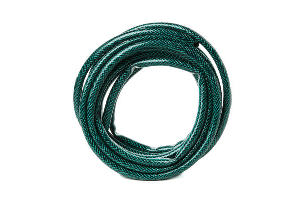 istock Green garden hose isolated on white background 1211528962