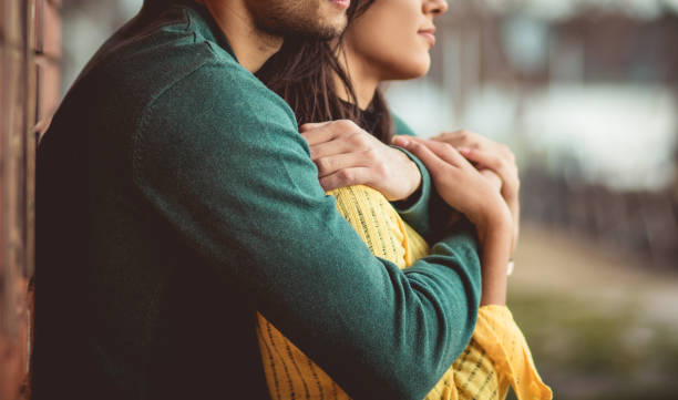 I love you infinity amounts. I love you infinity amounts. Young happy couple in the park. Close up. falling in love stock pictures, royalty-free photos & images