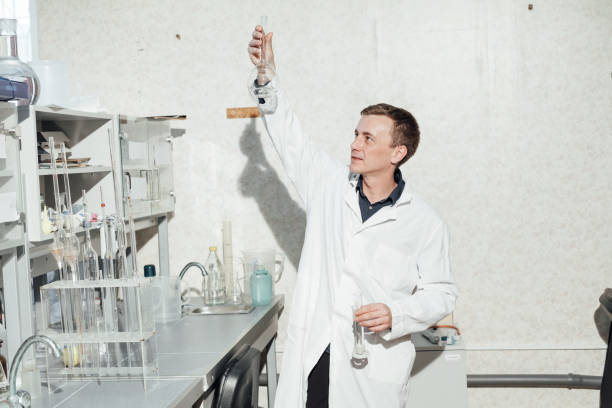 istock young scientist conducts chemical experiments in the laboratory 1211530974