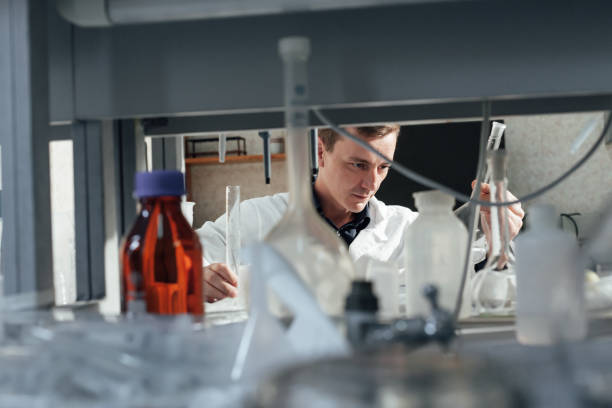 istock young scientist conducts chemical experiments in the laboratory 1211531158