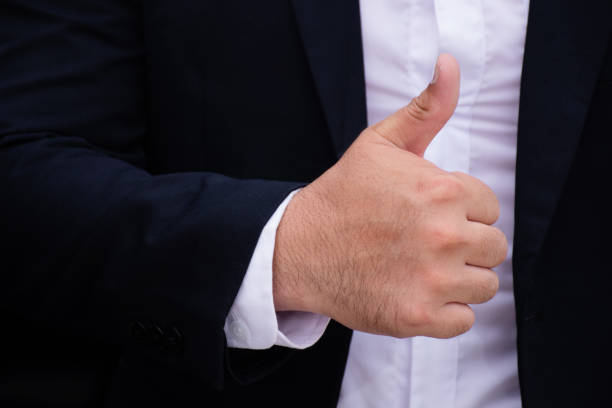 istock businessman with thumb up 1211531211