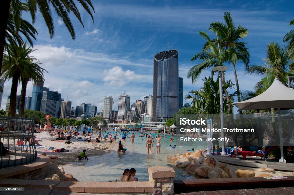Brisbane artificial street beach and pool Brisbane, Queensland, Australia - 27th January 2020 : View of South Bank artificial street beach and pools on a sunny day with many tourists enjoying a bath in fresh water Brisbane Stock Photo